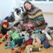 Britain's brightest pooch Harvey pictured at home next to his proud owner Irene Hewlett