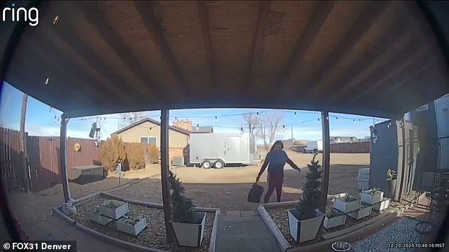 Door cam footage shows an unidentified woman carelessly throwing the dog carrier bag on the ground before strolling away