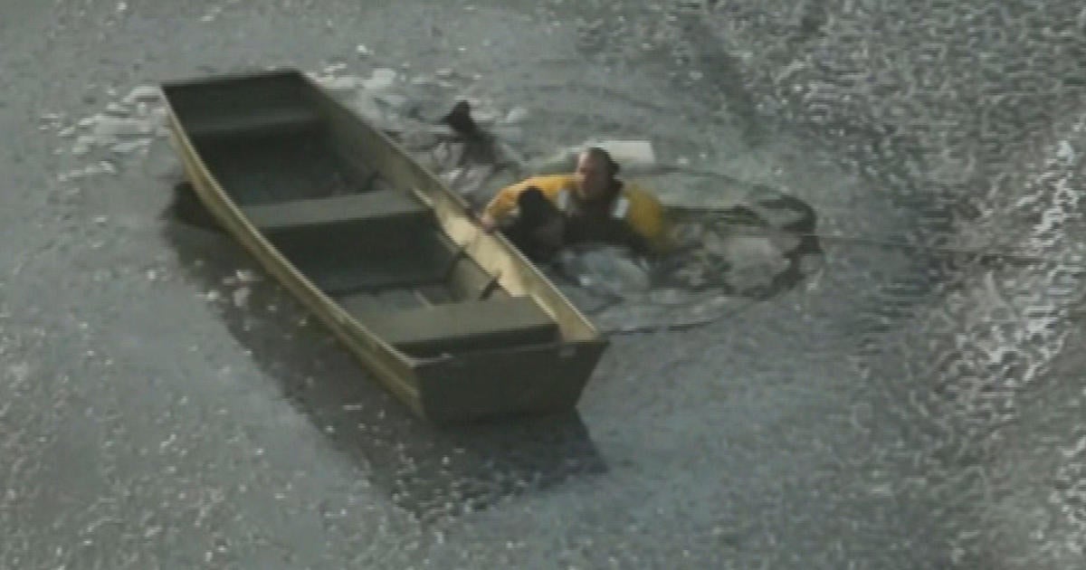 Video shows firefighters rescue man and dog from icy Massachusetts lake